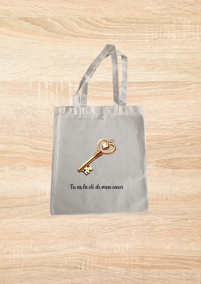 Sac fourre tout motif clé couleur or 