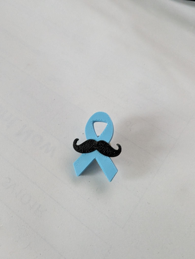 Pin&#039;s Novembre bleu