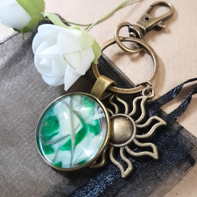 RAYON DE SOLEIL - Bijou de sac - Vert &amp; blanc