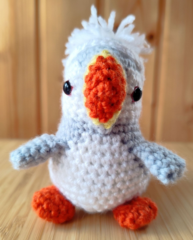 Waldo, the white puffin with grey and white hat, small size (made from merino wool yarn)