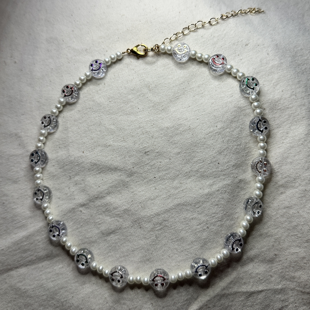 Transparent pearl smiley face necklace 