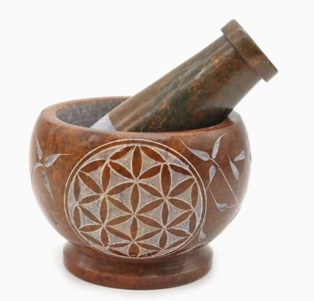 Vuolukivimortti & survin. Elämän oranssi kukka