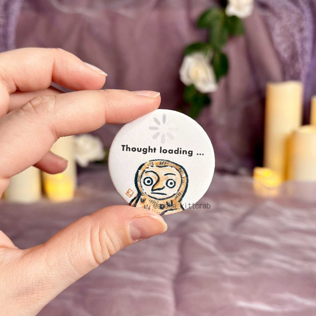 Thought loading button pin 