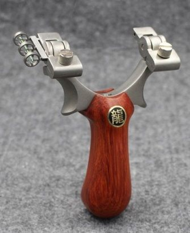 10E1 ... lance pierre compétition bois inox à pince pivotante   - (2 bandes)