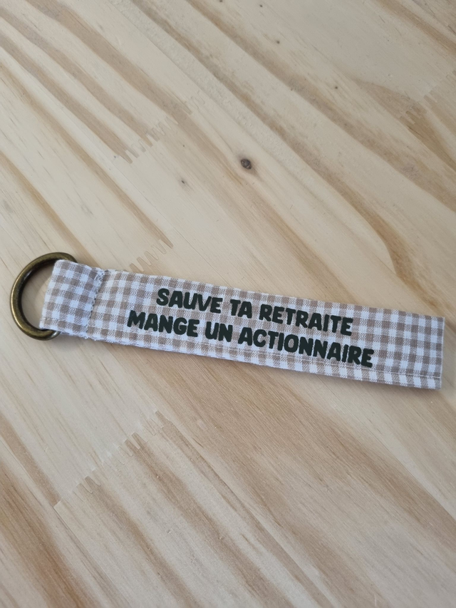 Porte-clé &quot;sauve ta retraite mange un actionnaire&quot;