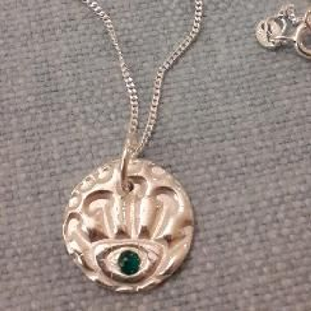 Silver and emerald  seed pod pendant 