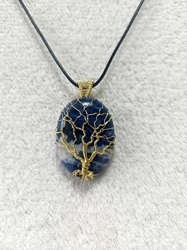 Arbre de vie couleur or sur sodalite marbré