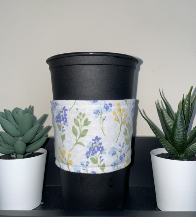 White with blue/yellow/purple flowers