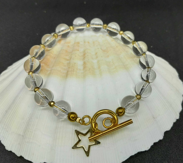 Bracelet cristal de roche 8 mm acier or 