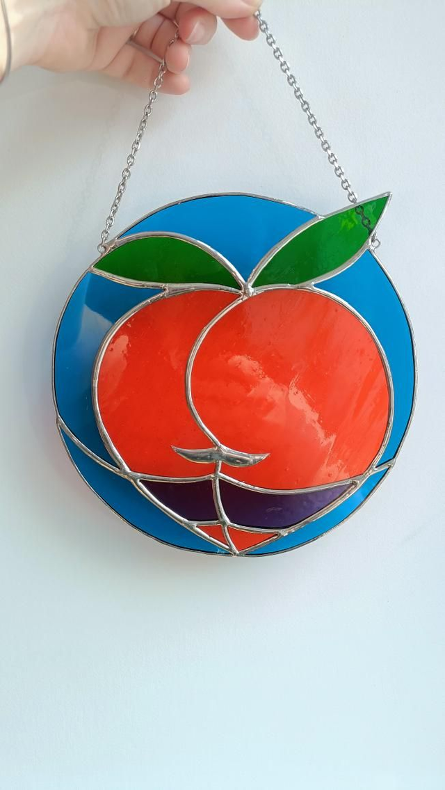 Big boule de pêche orange et bleu