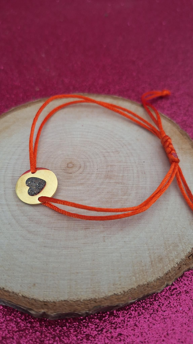 Bracelet cordon orange cœur paillettes noires/blanches/dorées 