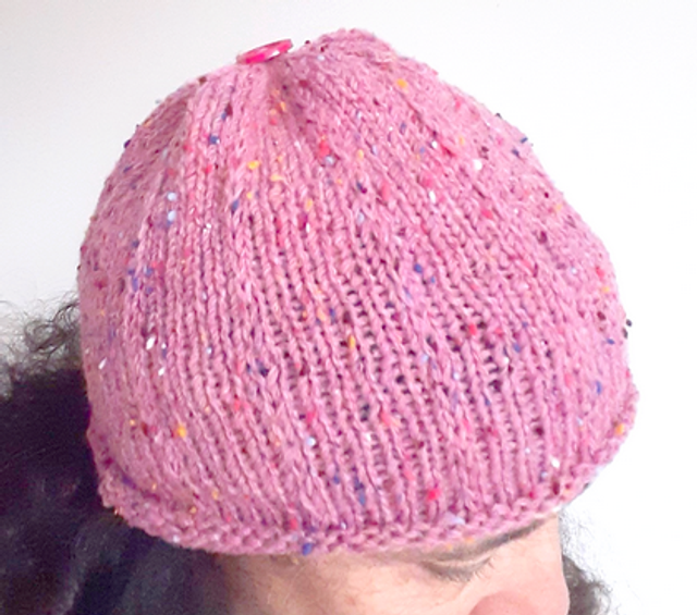 Bonnet moucheté rose