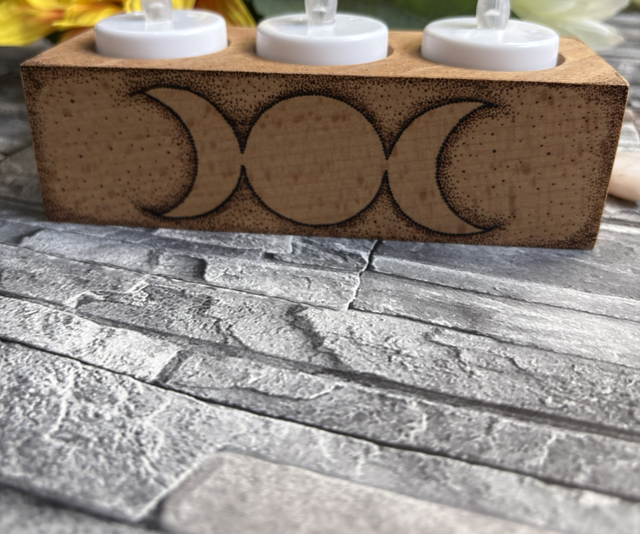 Triple moon tealight holder