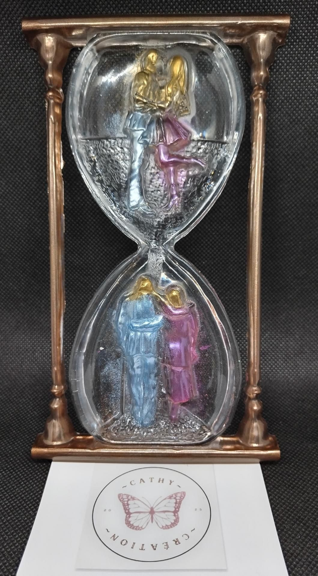 Sablier couple contour marron avec support de fixation 