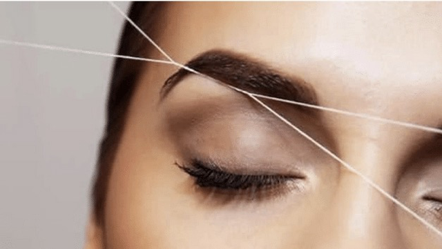 Épilation fil sourcil 