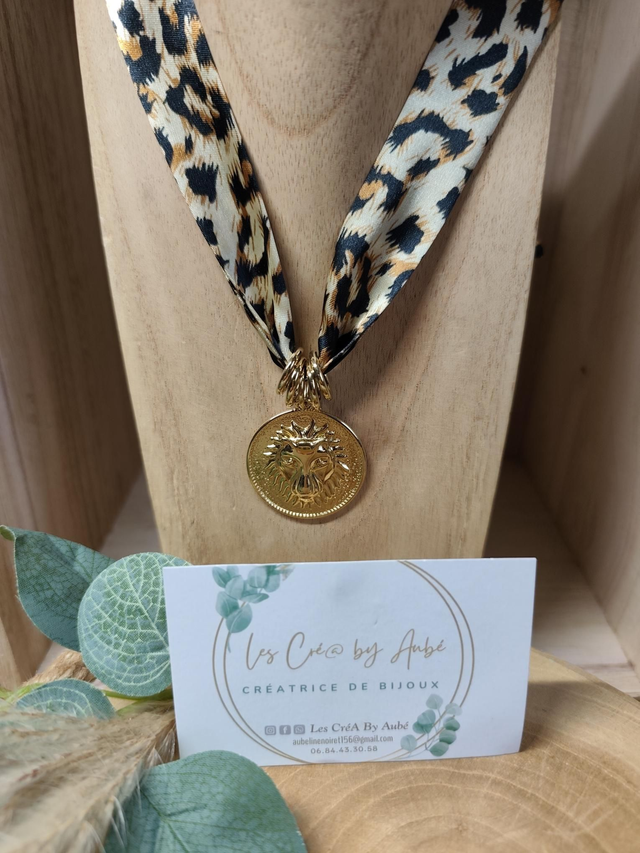COLLIER RUBAN LEOPARD/ MEDAILLE LION ACIER INOXY GOLD 0000624