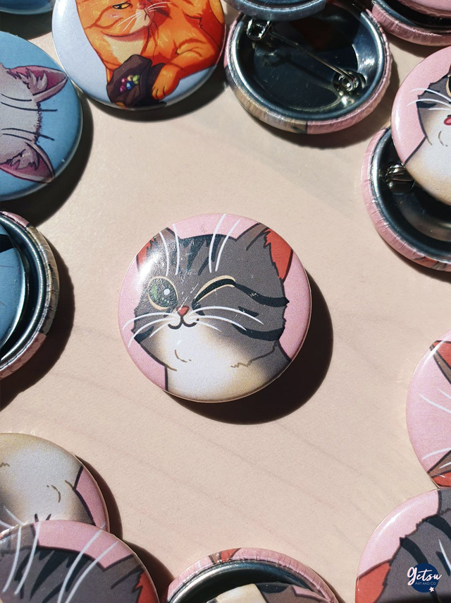 Badge chat émotion wink