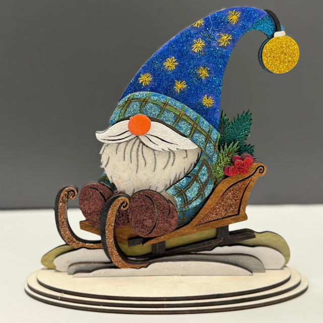 Figur "Zwerg auf Schlitten"