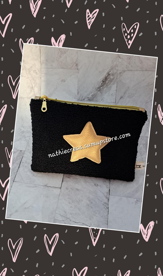 Pochette moumoute noir à étoile doré 