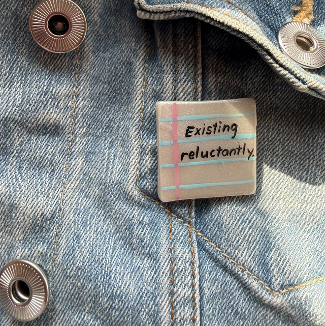 Existing reluctantly - Sarcastic Handwritten Pin Badge