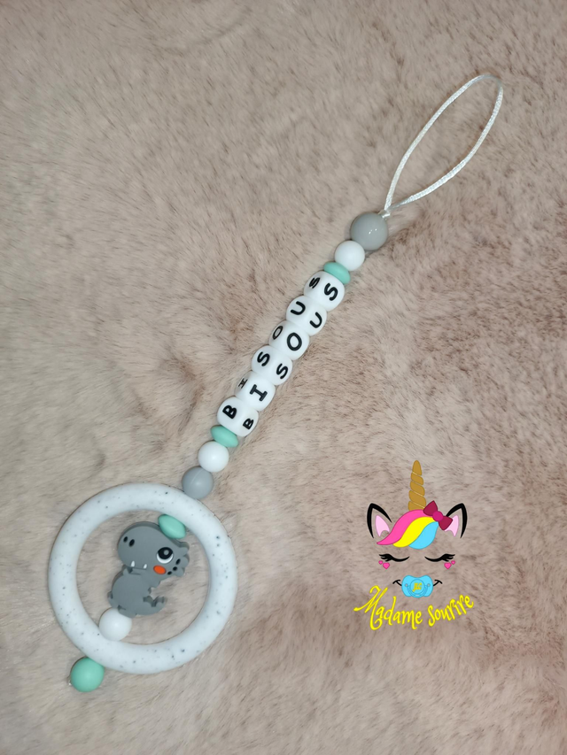 Attache tétine dentition Dinosaure