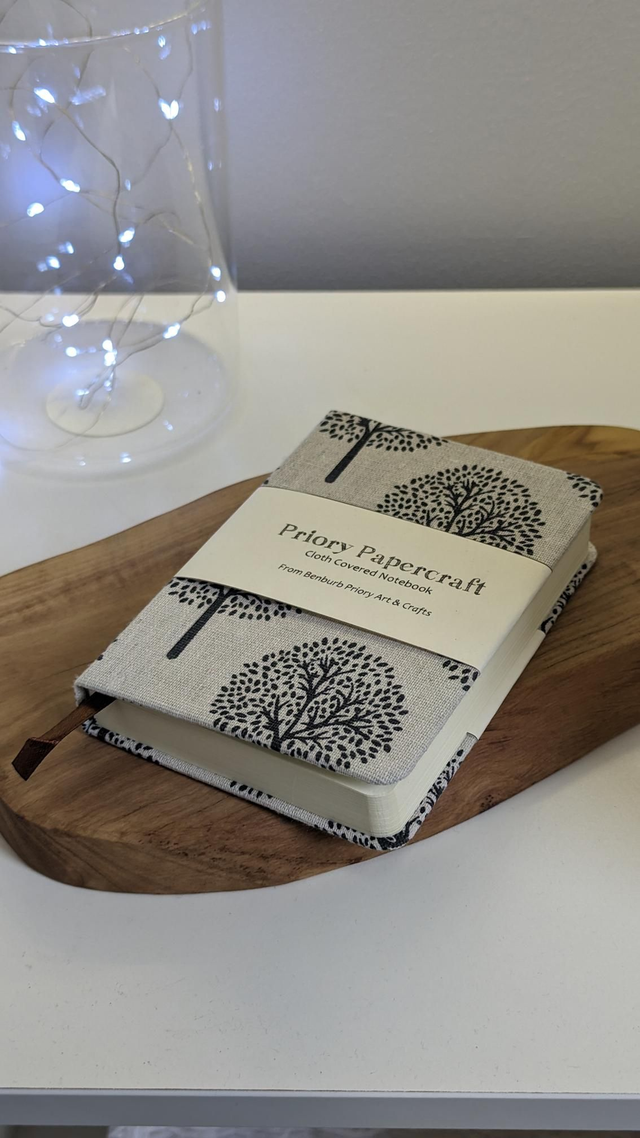 Cloth bound A6 notebook with smooth cream paper