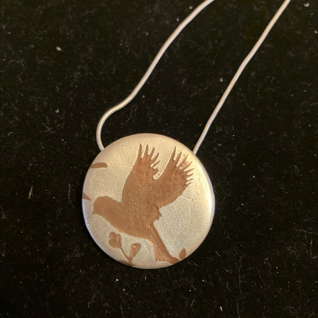 Inlaid copper bird pendant 