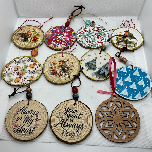 Handmade Christmas decorations. Hanging wooden decorations.