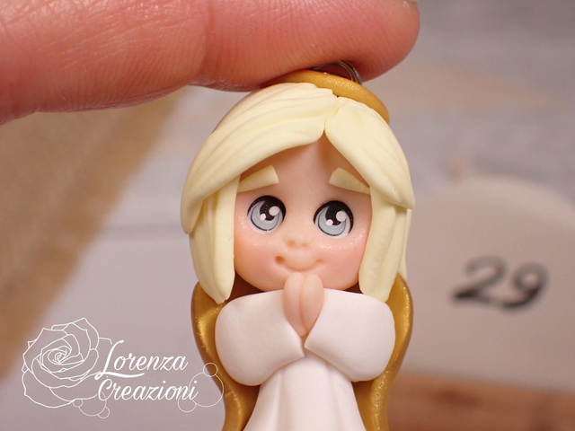 Angioletto custode tascabile n. 29
Portachiavi o charm, artigianale, pezzo unico. Modellato a mano argilla polimerica, made in Italy.