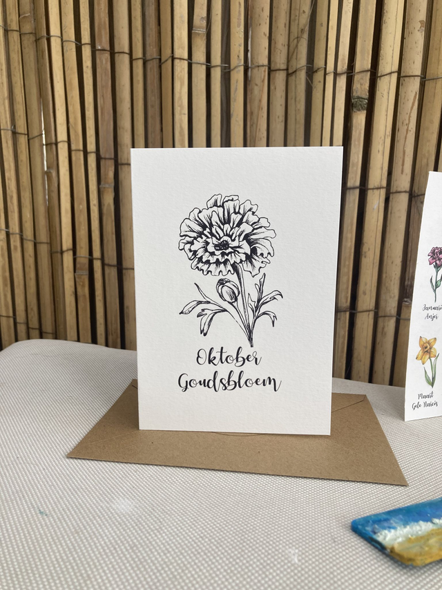 Ansichtkaart Geboortebloem Oktober Goudsbloem zwart wit, inclusief envelop, van originele tekening, met of zonder tekst 