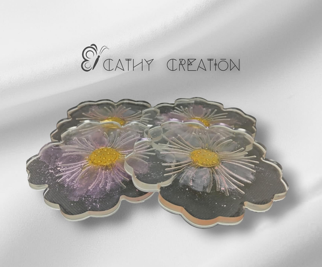 Lot de 4 sous verre forme fleur reflets roses 