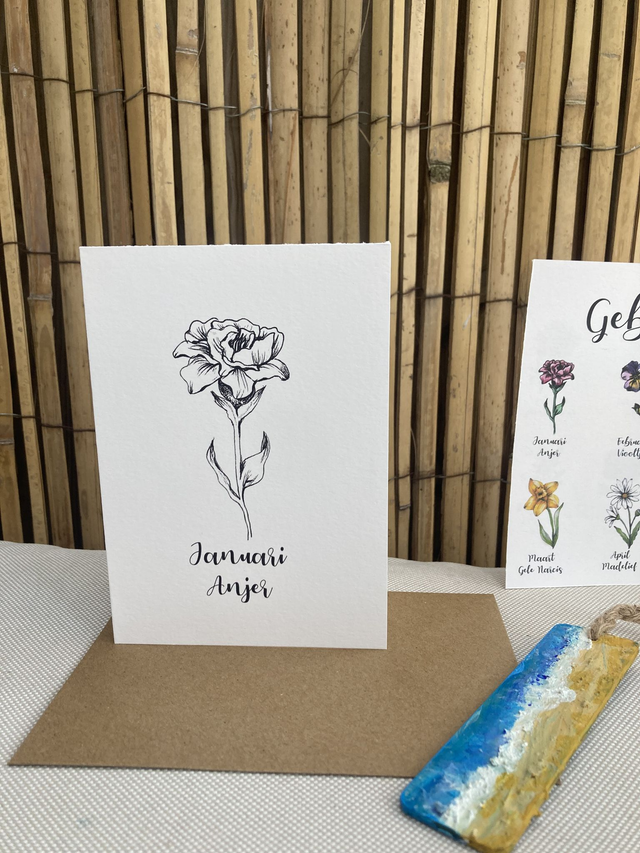 Ansichtkaart Geboortebloem Januari Zwart Wit, inclusief envelop, van originele tekening, met of zonder tekst