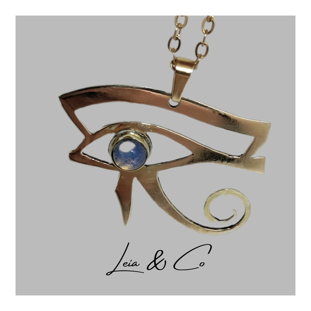 Pendentif symbole égyptien oeil d&#039;Horus doré avec Opalite LEIA&amp;CO