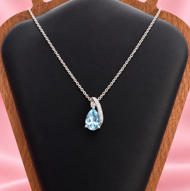 Sterling Silver &amp; Blue Topaz Pear Cut Pendant With Belcher Chain