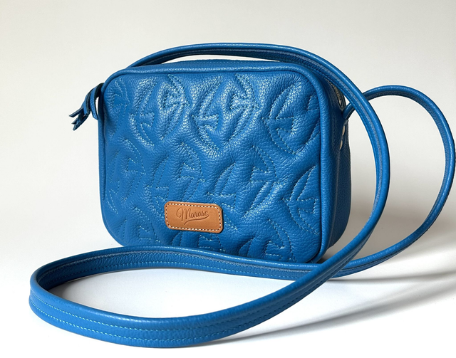 Matelassé "hirondelles"