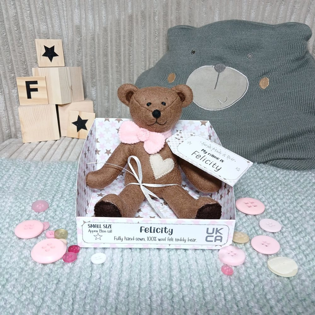 Felicity. Small size, handmade teddy bear. UKCA. Tray base packaging. Standard Wool Felt. Brown. Baby pink. Beige.