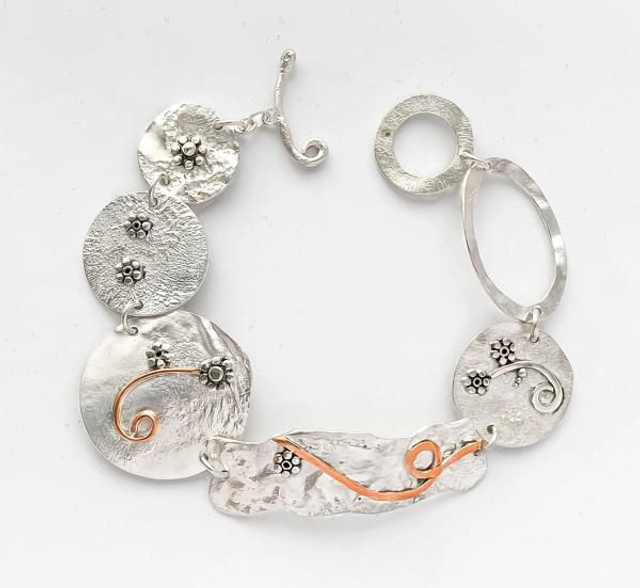 Pulsera Margaritas Reti en Plata y Cobre