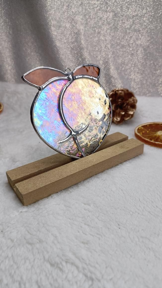 Boule de pêche iridescent et ambré 