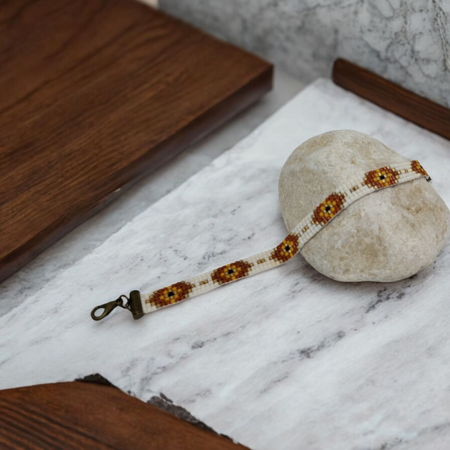 Bracelet blanc, caramel et orange