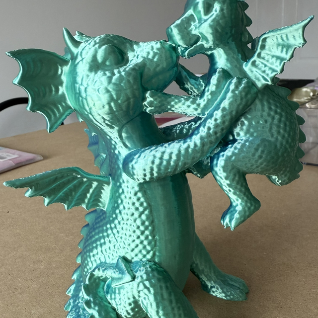 Beautiful 3D printed baby dragon with adult