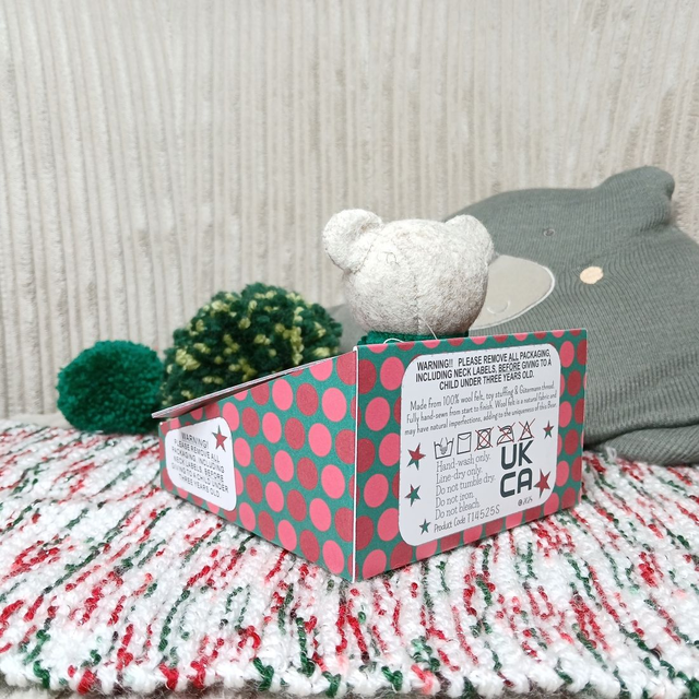 Holly. Small size, handmade teddy bear. UKCA. Tray base packaging. Standard Wool Felt. Traditional. Beige. Emerald green. Christmas red. Sorbet pink.