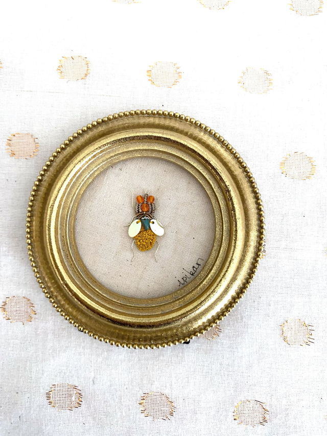 Cadre rond mouche moutarde