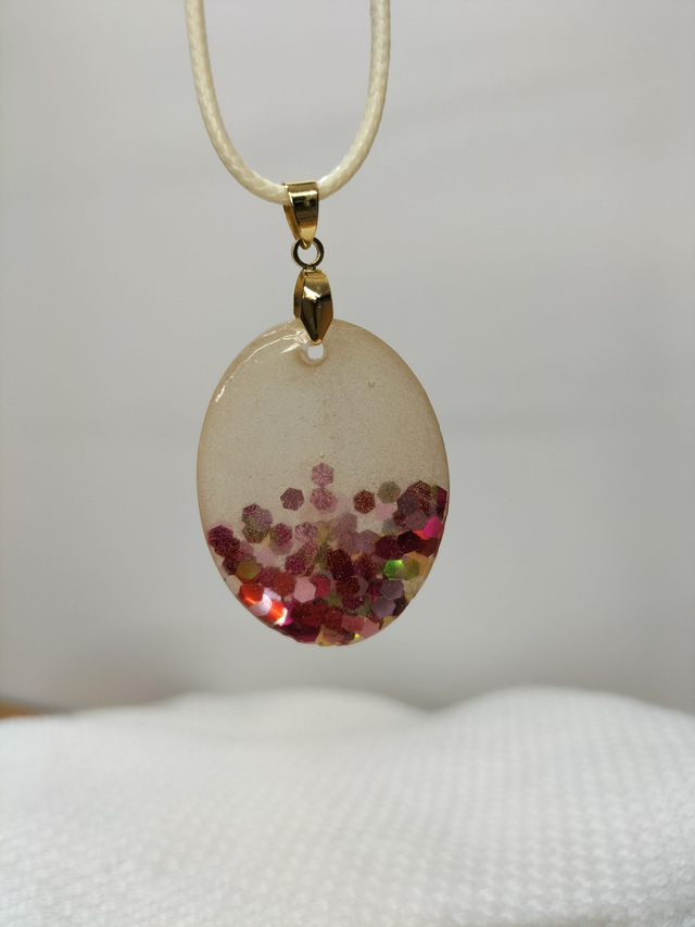 Pendentif or et paillettes