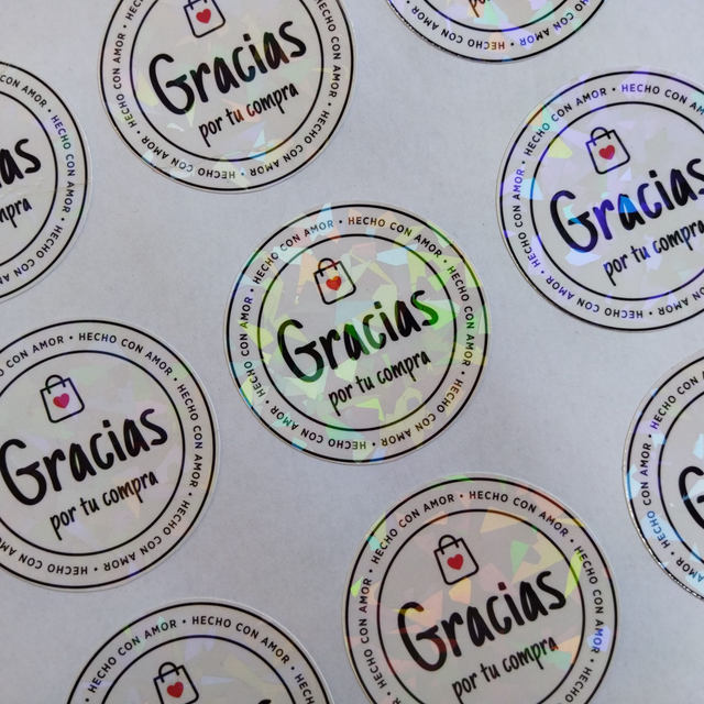 sticker brillante con laminado holográfico troquel circular 