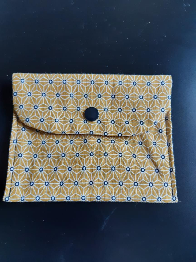 Pochette imperméable étoile moutarde 
