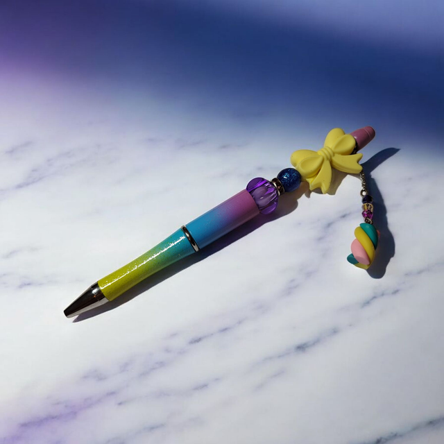 Stylo perles jaune bleu violet