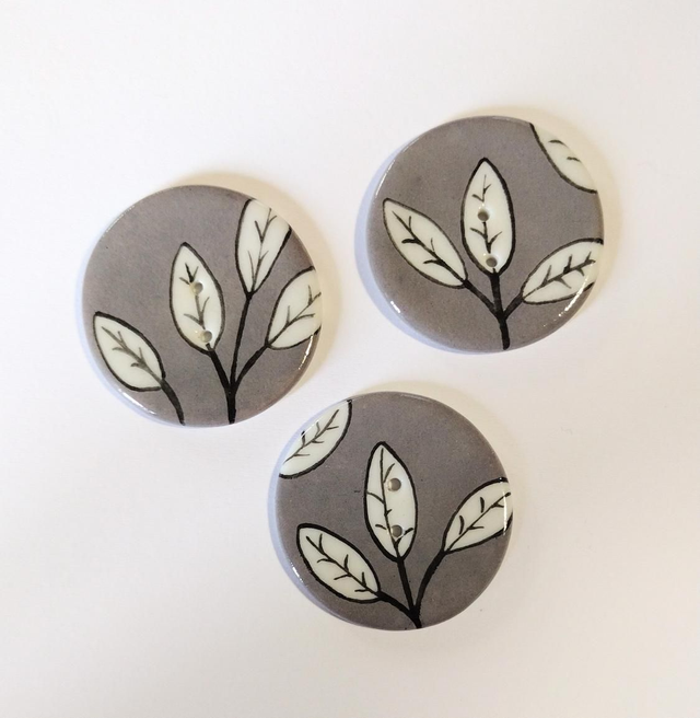 Bouton feuillage gris taupe 