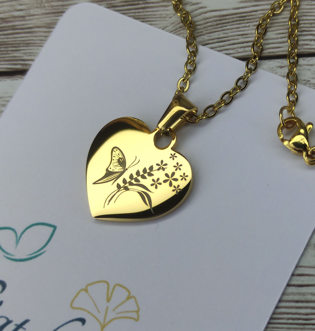 Collier &quot;Papillon et fleurs&quot; cœur doré 
