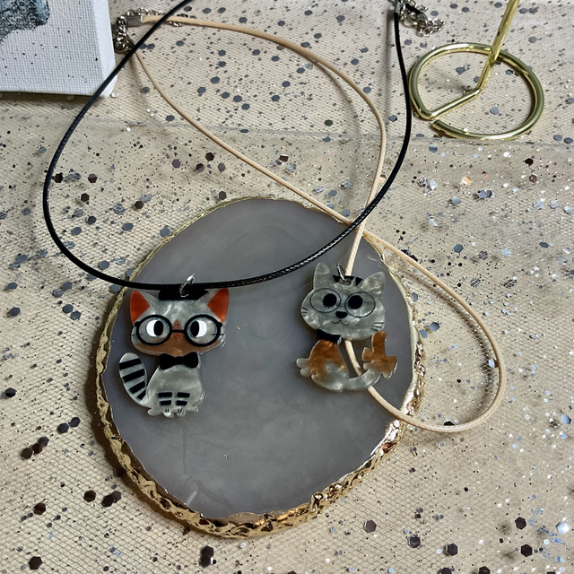 Handmade necklace with cute cat’s pendant.