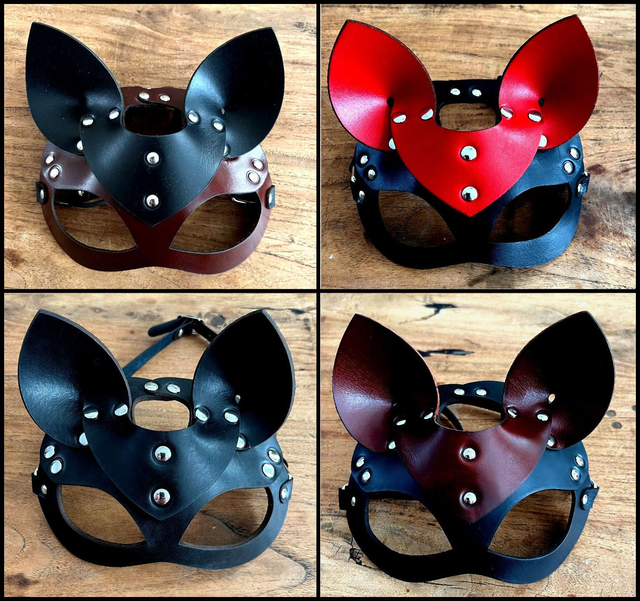 Catmasker van echt tuigleer in verschillende kleuren.